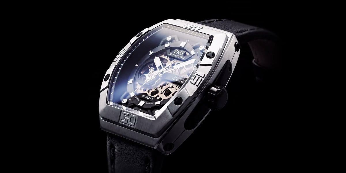 RMS Zeitmeister AG2235.92 automatic watch with a skeletonized black dial that shows the movement, in a steel tonneau case