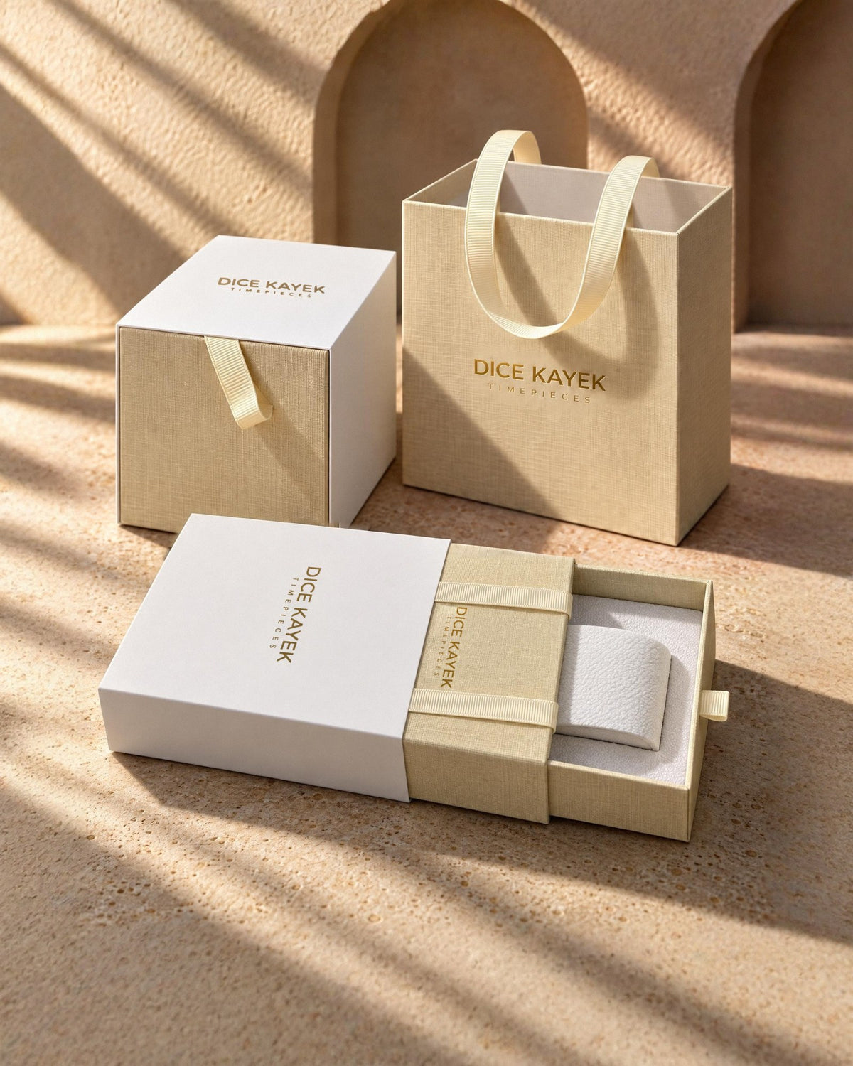 The Dice Kayek drawer box, cube box and ribbon-handled gift bag